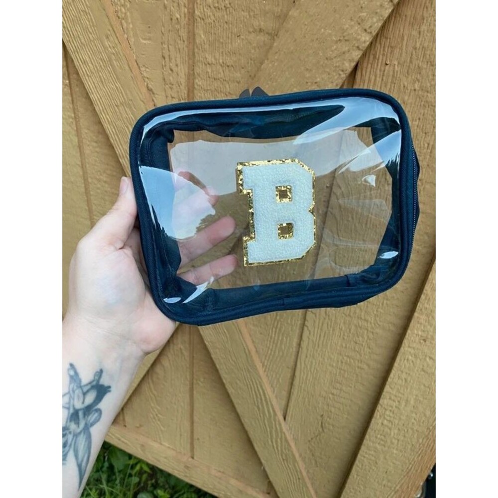 Initial makeup or toiletries bag